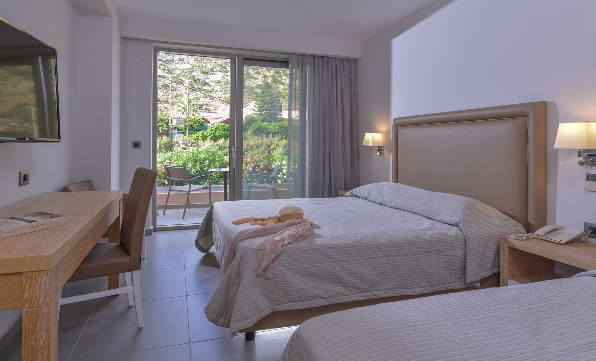 Room with two beds and a view