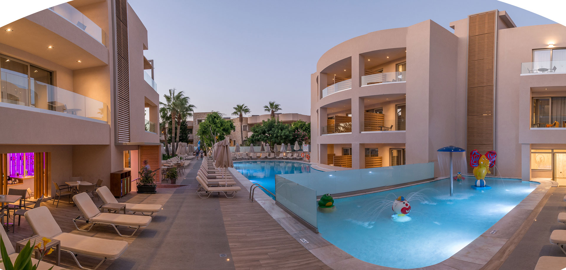 Hotel pool with sunbeds
