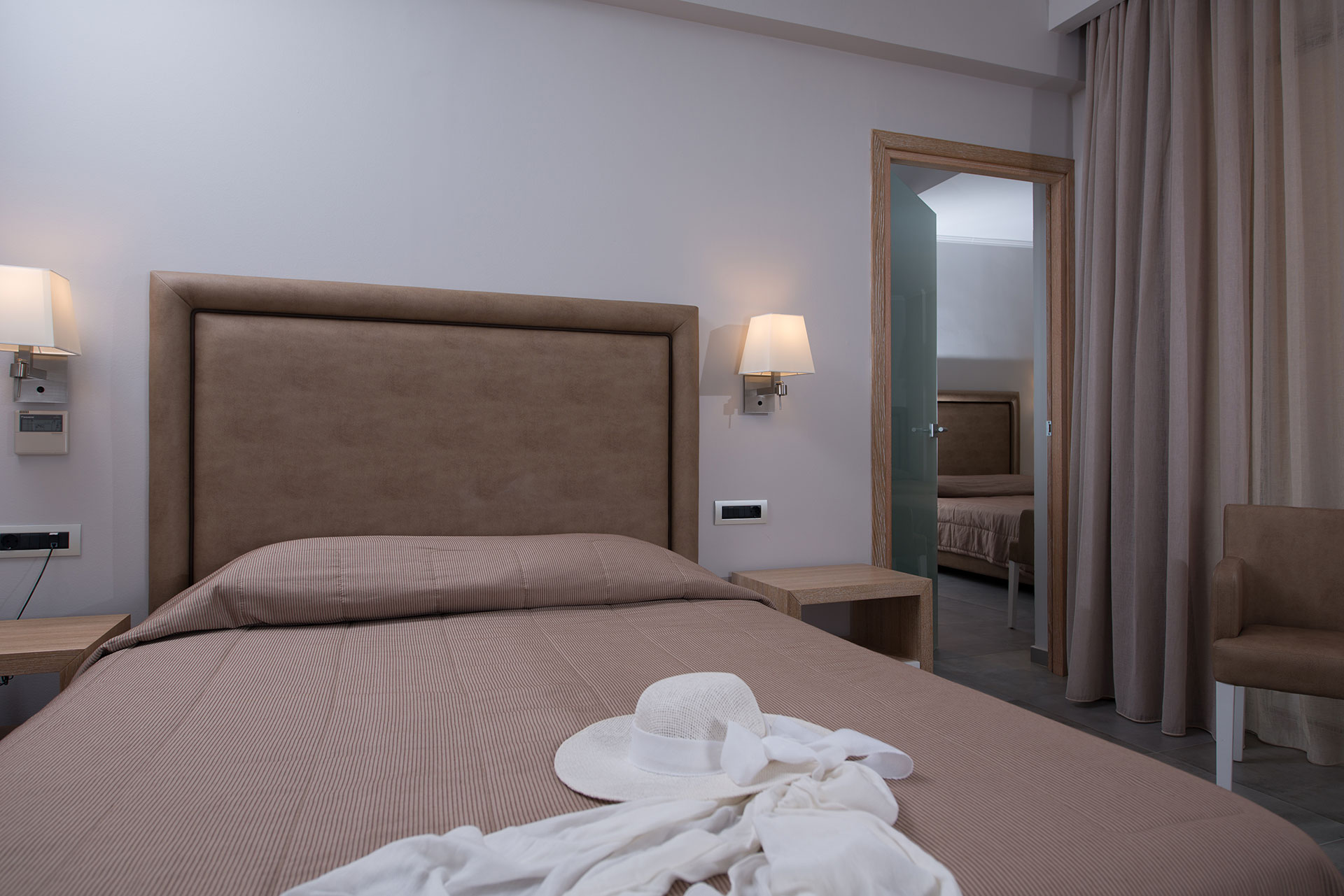 Double hotel bed that has another room within the room